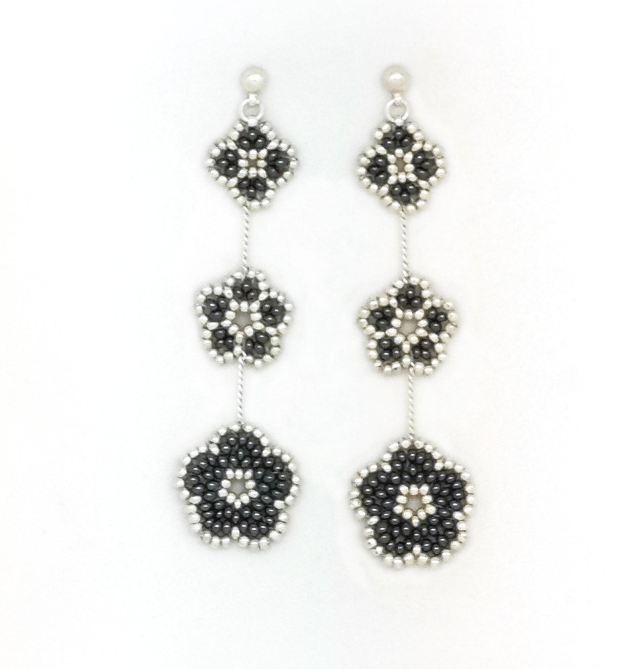 Aretes nomeolvides triples plata.