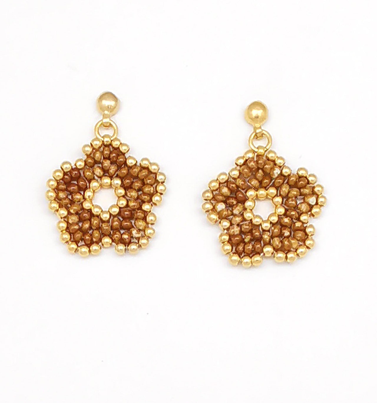 Aretes nomeolvides medianos dorado.