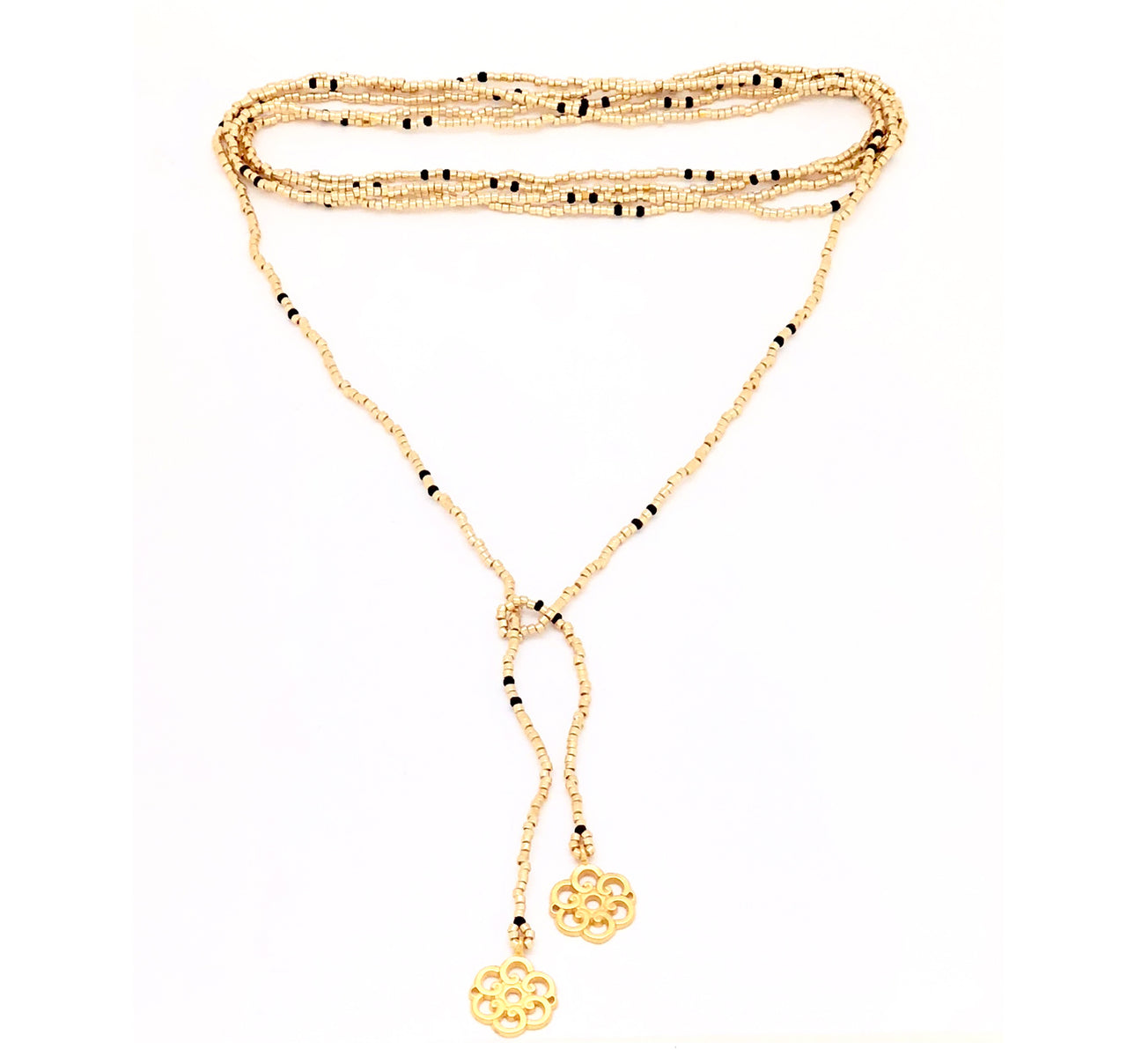 Collar enredable dorado detalles negros.