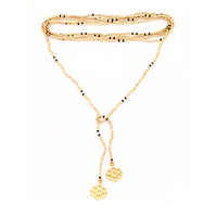 Thumbnail for Collar enredable dorado detalles negros.