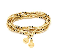 Thumbnail for Collar enredable dorado detalles negros.