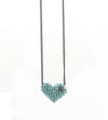 Collar corazón con cadena de plata pavonada.