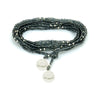 Collar enredable azul humo detalles plata.
