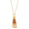 Collar flecos dorado.