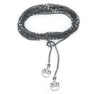 Collar enredable gris detalles plata.